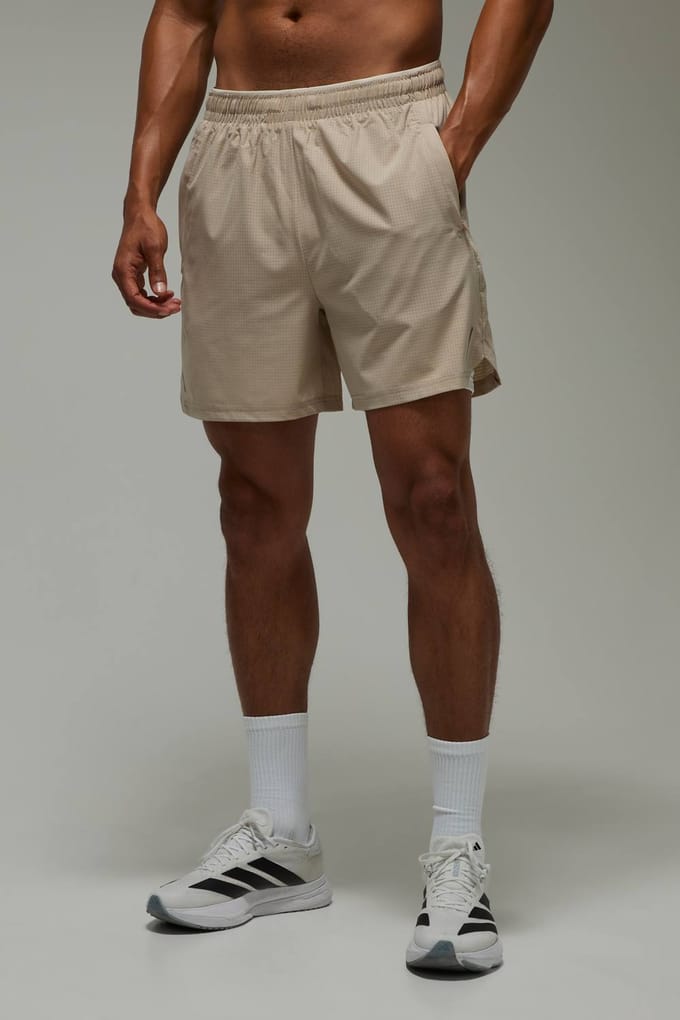 Geperforeerde 2-in-1 Hardloopshort Common Pace | Taupe | Size Small