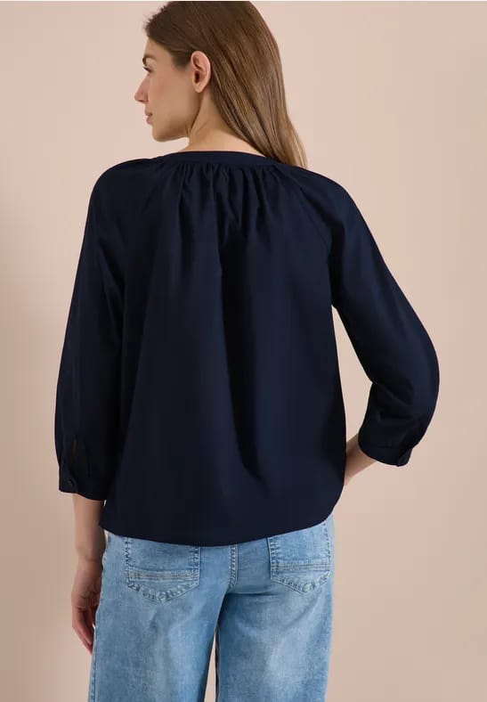 Blouse met 3/4 mouwen en gespleten hals in effen kleur