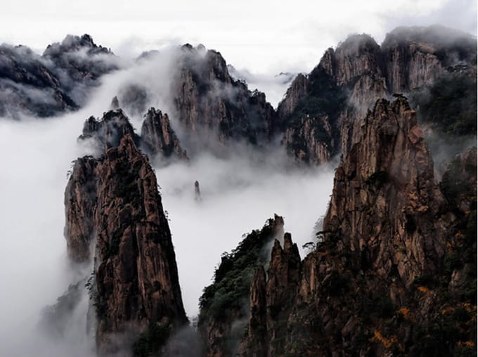 Fotobehang - Zee van wolken in Huangshan Mountain, China.