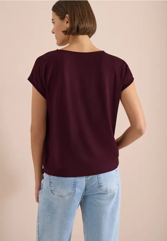 Blouse met ronde hals en knoopdetail