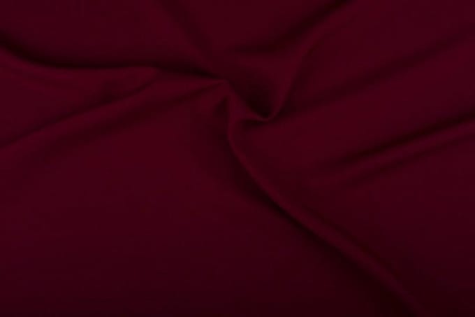 Texture/Polyester stof - Bordeaux rood - 25 meter