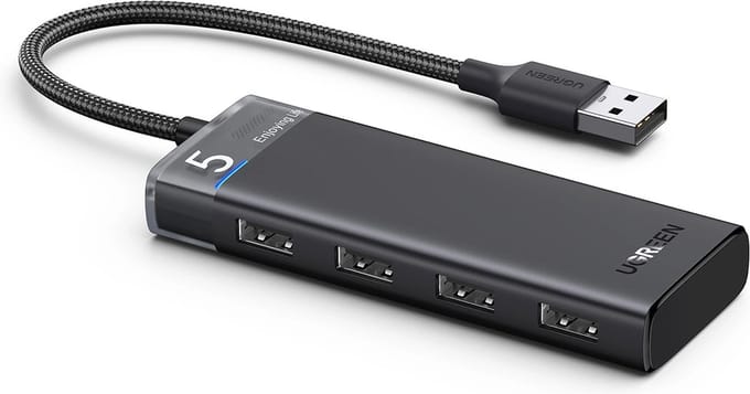 Ugreen - CM653 - HUB met - 4 - USB-A-poorten - en - USB-A-voedingskabel - zwart