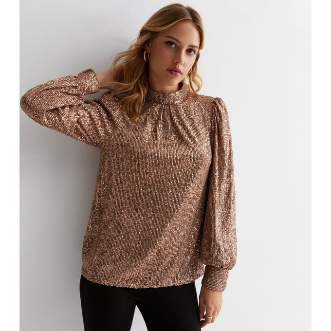 Loosefit blouse met hoge hals en pailletten