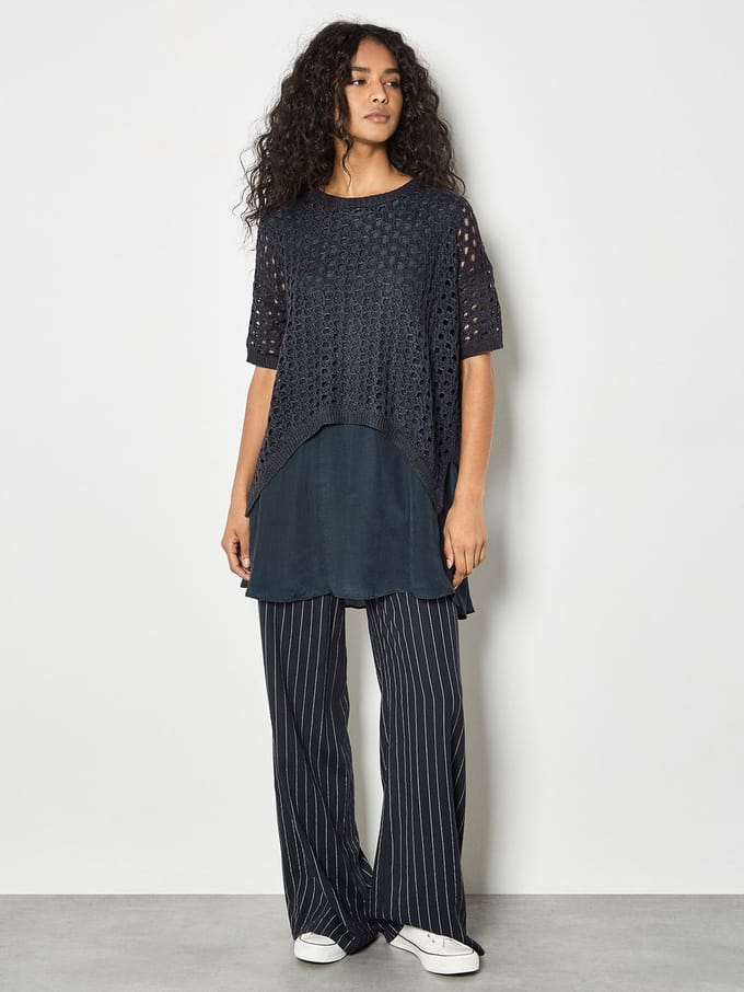 Glanzende tuniek met mesh-lagen