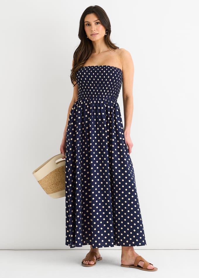 Marineblauwe midi-jurk met gerimpelde bovenkant en viscose stippen