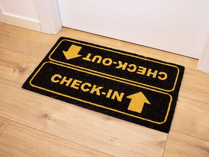 i-total - Deurmat Check-In Check-Out