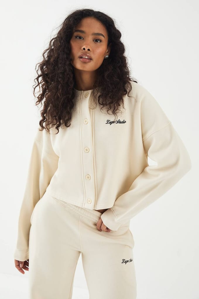 Dames DSGN Studio Doorknoop Sweatshirt | Creme | Maat: Medium