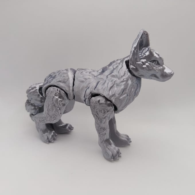 gearticuleerde wolf fidget speelgoed zilver