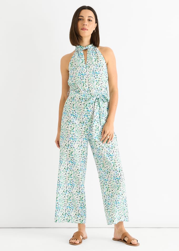 Blauwe jumpsuit met bloemenprint en halternek
