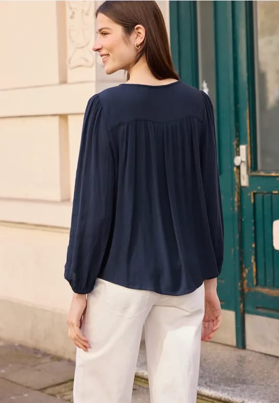 3/4 mouw blouse met ronde hals en knopen