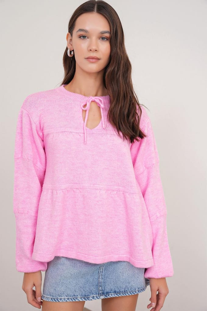 V loose knit sweater met strikdetails