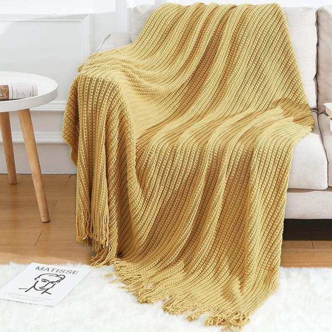 Zachte gebreide plaid deken met franjes voor thuisdecoratie