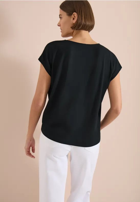Blouse met ronde hals en knoopdetail
