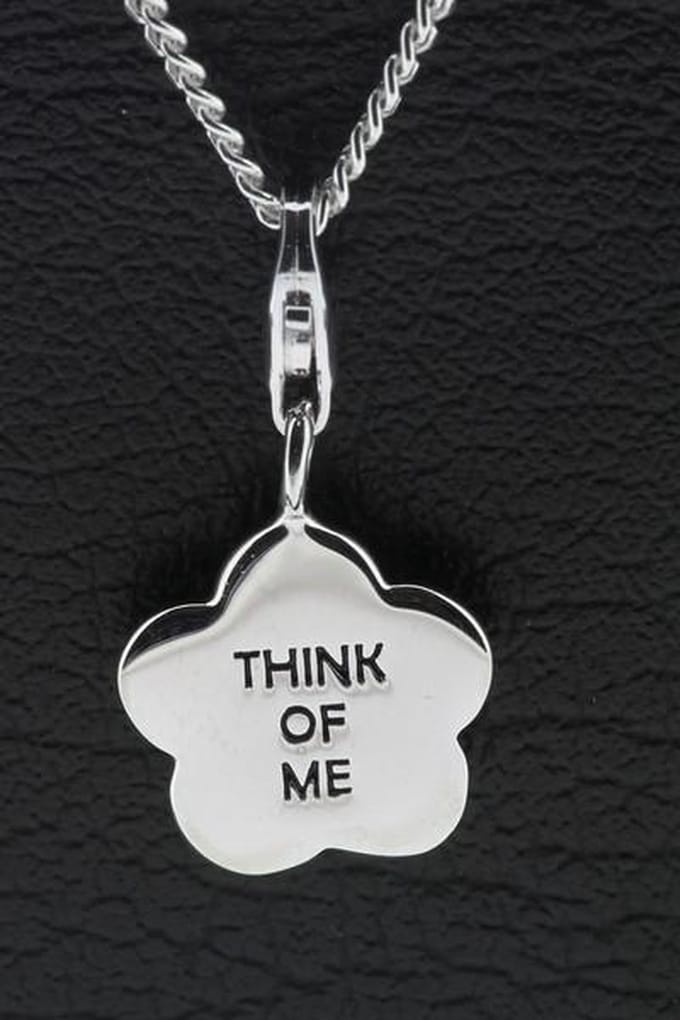 Zilveren Bloem met tekst Think of me hanger én bedel