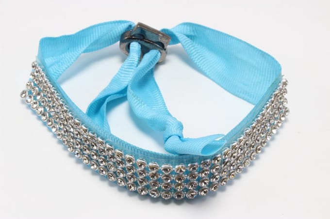 Armband verstelbaar blauw met 4 rijen strass
