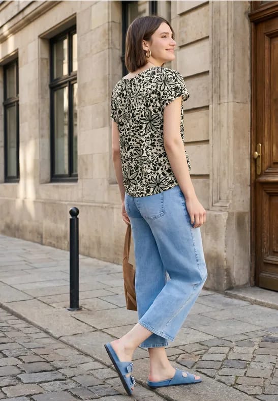 Blouse met hangende schouder en linten