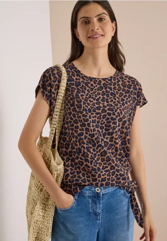 Blouse met afhangende schouders en knoop