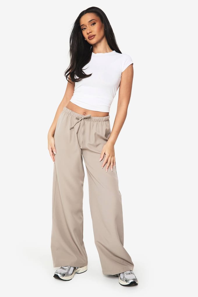 boohoo Dames Geweven Elastische Low Rise Wijde Pijp Broek | Zand | Maat: 42