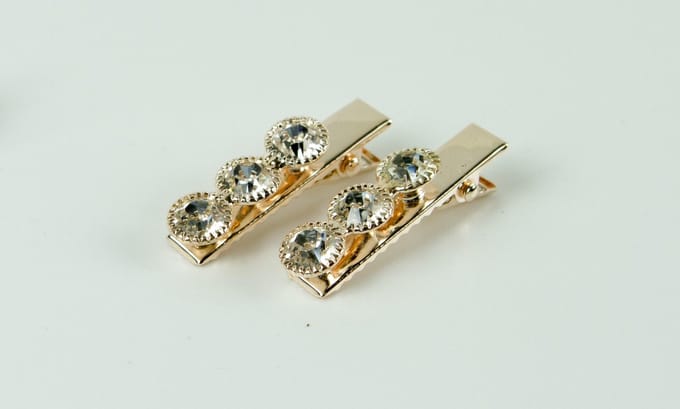 Duckklem rosékleurig 3 strass stenen