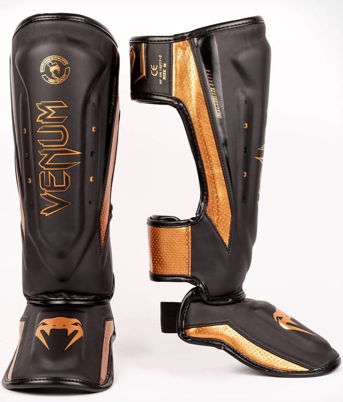 Venum Elite Evo Kickboks Scheenbeschermers Zwart Brons - M