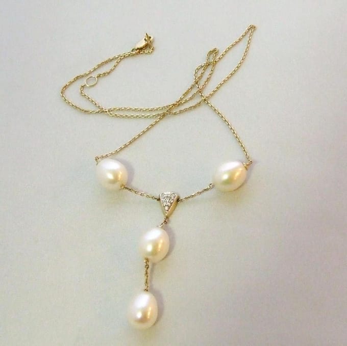 Gouden collier met parels