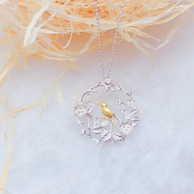 Ketting met hanger vogel goud/geel