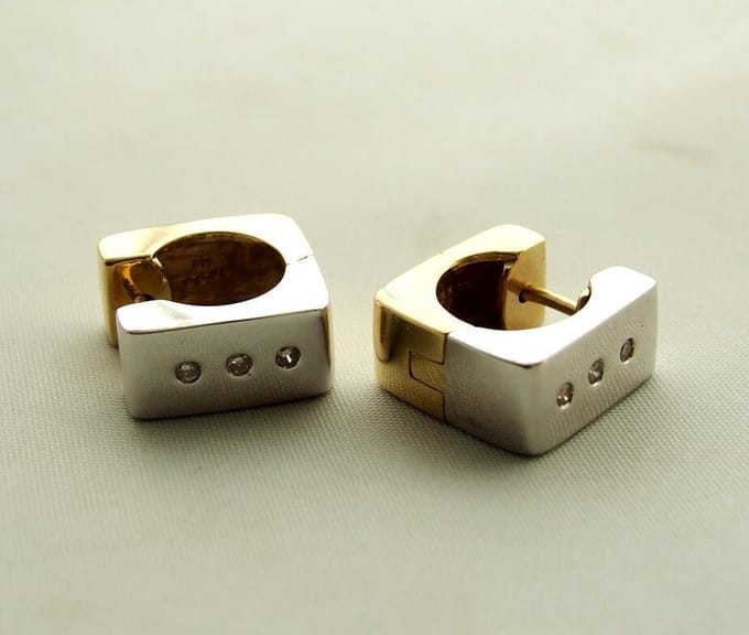 Bicolor oorringen met diamant
