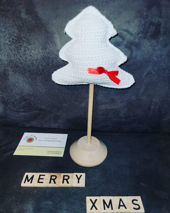 Kerstboom op stok