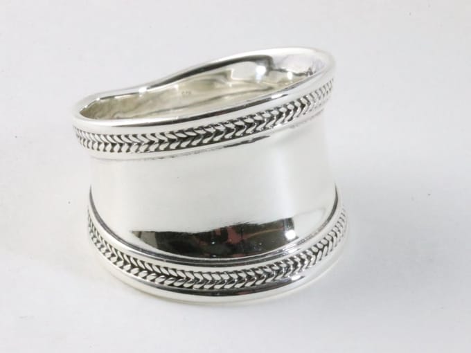 Brede hoogglans zilveren ring met kabelpatronen - maat 18
