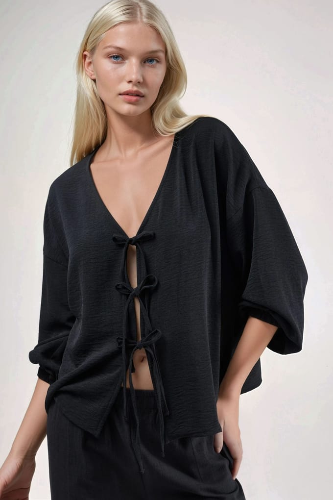 Oversized V-hals Blouse met Striksluiting