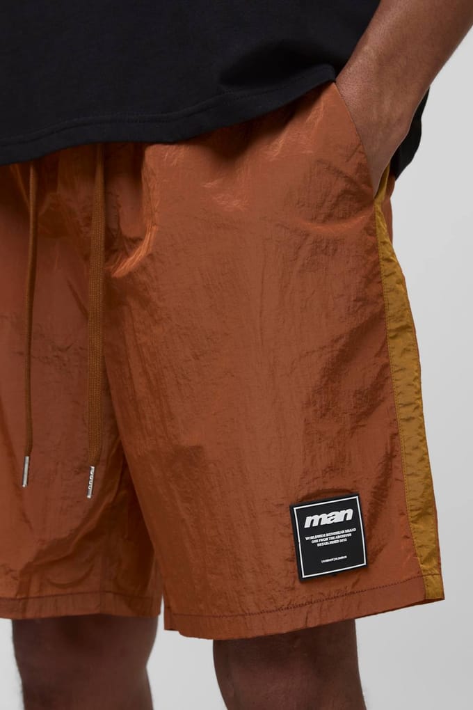 Relaxte pasvorm hoogglanzende gerimpelde nylonshorts | Burnt Orange | Size Medium
