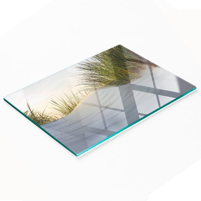 Glazen keukensnijplank met afbeelding van duinen aan zee, 80x52 cm