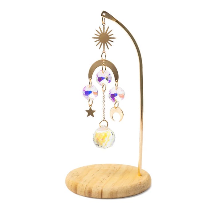 Regenboogkristal suncatcher op houten voet met zon, maan en ster
