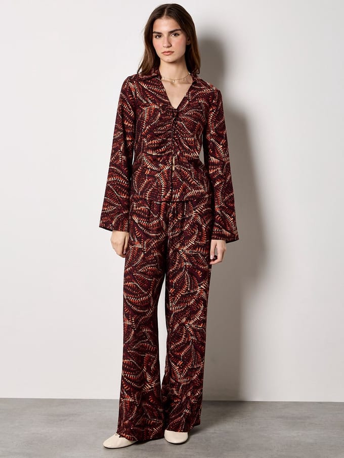 Broek met wijde pijpen en abstracte print