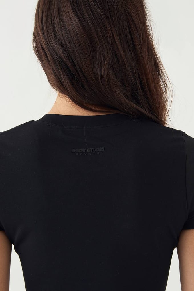 Dames DSGN Studio Ultra Sculpt V-hals Korte Mouw Top | Zwart | Maat: Large