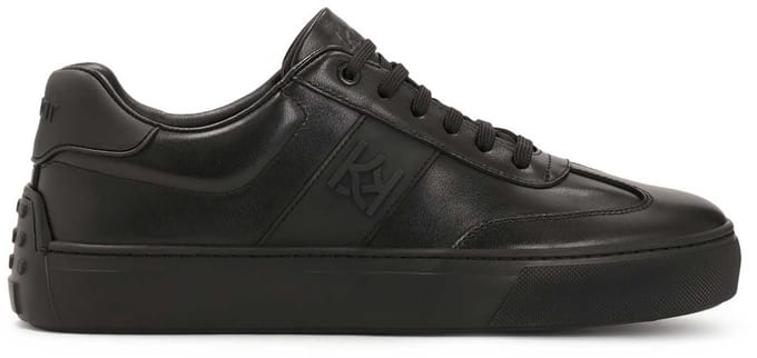Black leather sneakers with rubber on the heel