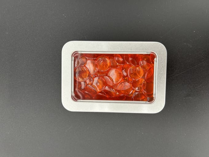 Rekenfiches in blikje (8x6 cm), Transparant oranje (100 st.)