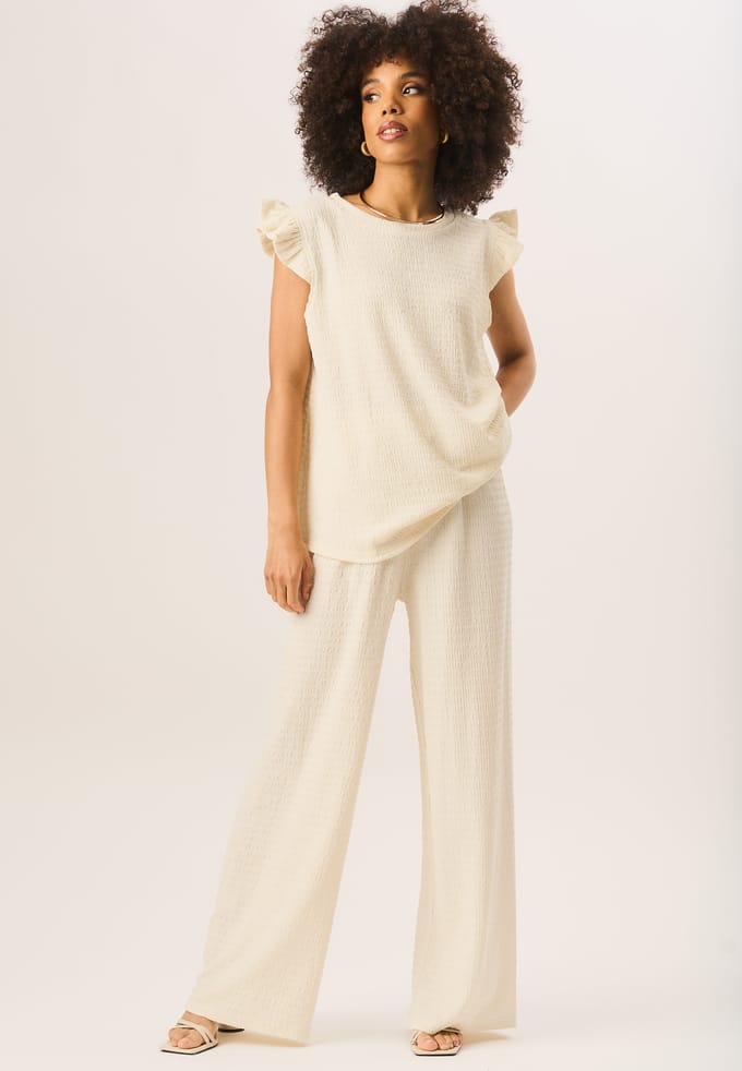 Oversized top met ruches en mouwen