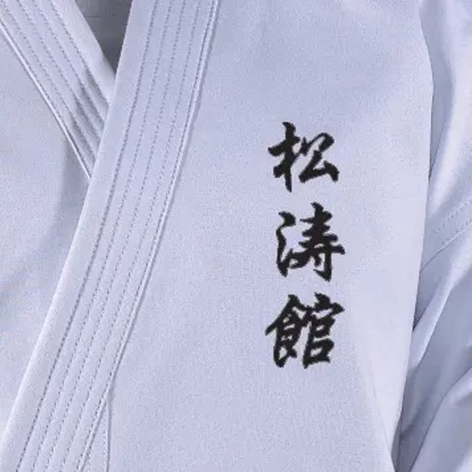 Borduurwerk op kimono karate Danrho Shotokan