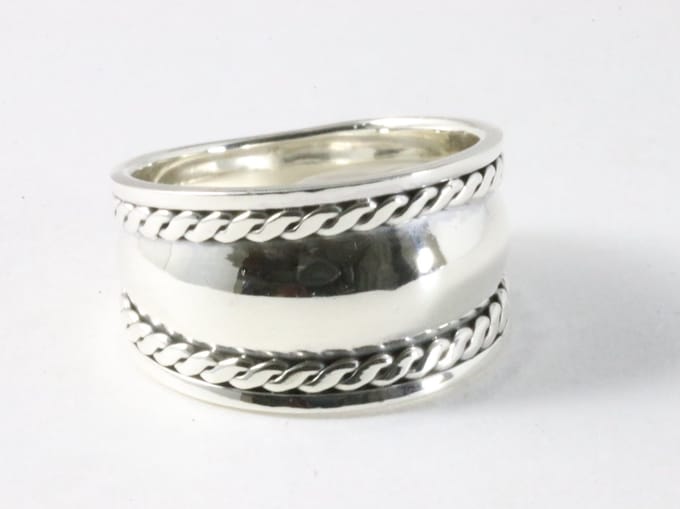 Brede hoogglans zilveren ring met kabelpatronen - maat 18