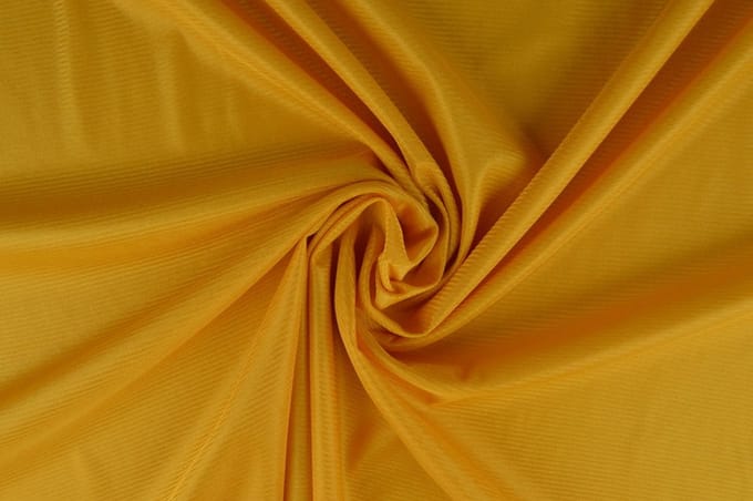55 meter stretch voering - Okergeel - 100% polyester