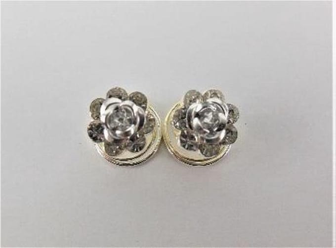 Curlies bloem met strass zilver.