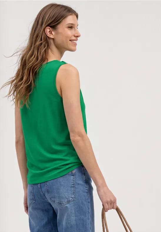 Top met V-hals en knoopdetail