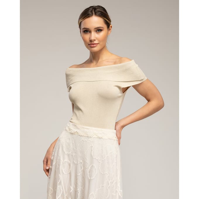 Gebreide top met lurex en een boothals