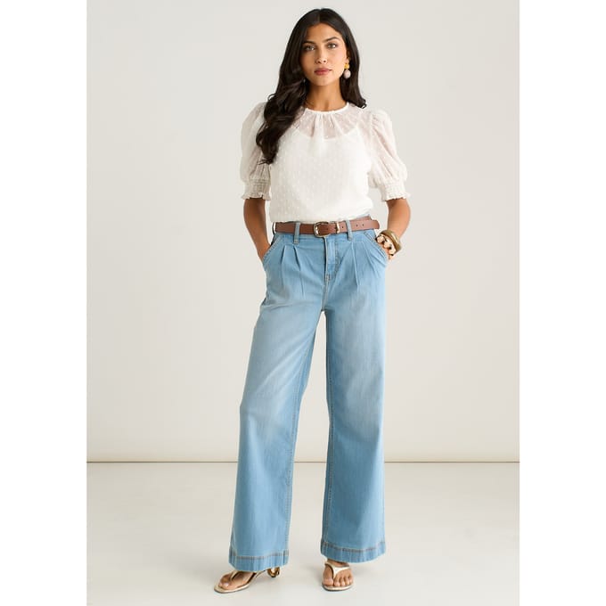 Lichtblauwe jeans met plooien en wijde pijpen