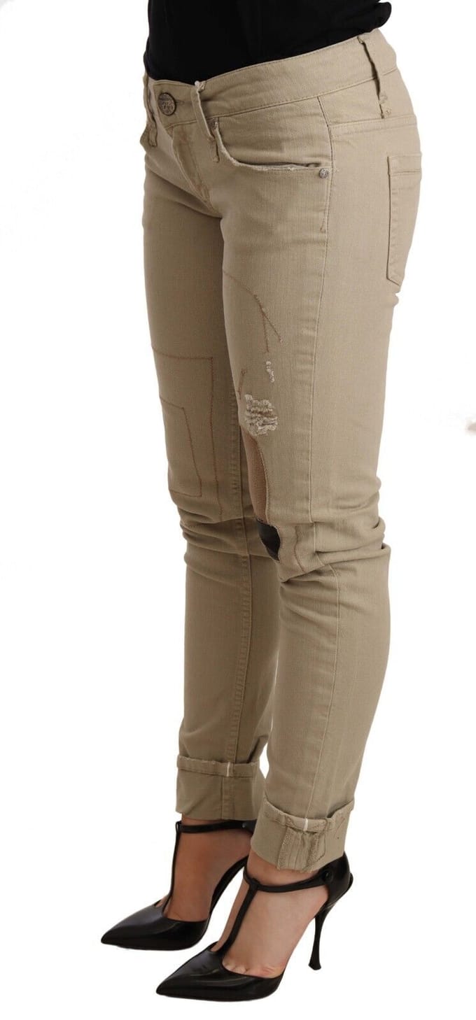 Acht Skinny Jeans Met Gescheurde Patches
