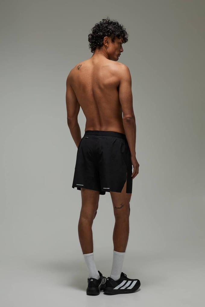 Common Pace Hardloop Race Day 5inch Split Short Met Binnenbroekje | Black | Size Small