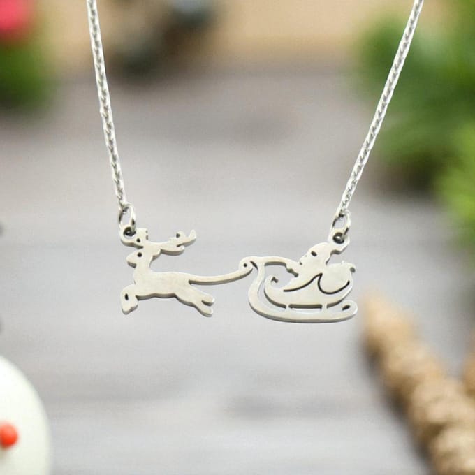 Zilveren ketting met rendier en arrenslee - Kerst accessoire