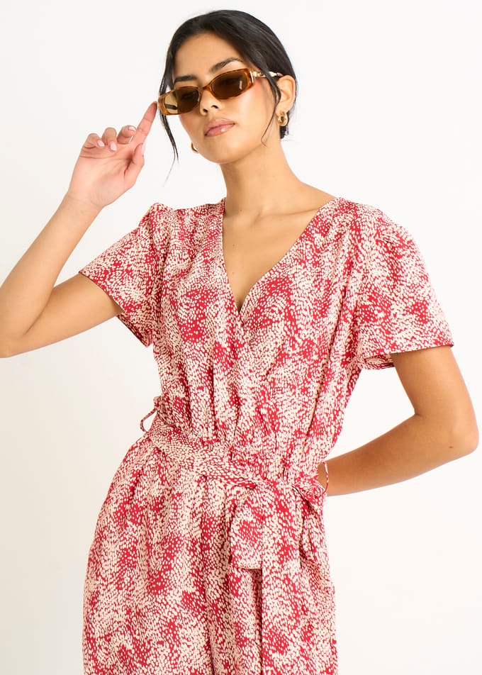 Rode abstracte dierenprint playsuit met overslag en ceintuur