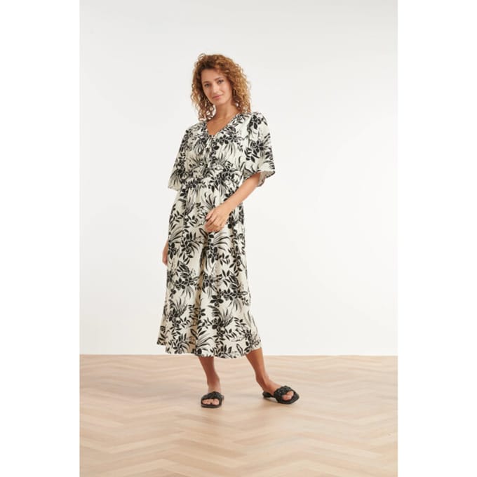 Smashed Lemon Zwart-witte jurk met tropische print en strikdetail |